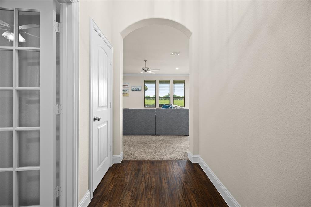2618 Byrd Ranch Road Midlothian, TX 76065 - Photo 6 of 38 a view of a kitchen from the hallway