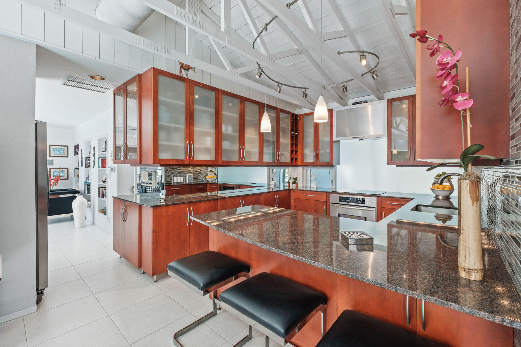 600 Southwest 2nd Street Boca Raton, FL 33486 - Photo 14 of 42 a kitchen with stainless steel appliances granite countertop a sink and cabinets