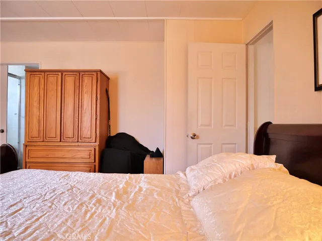 a bathroom with a shower sink and mirror