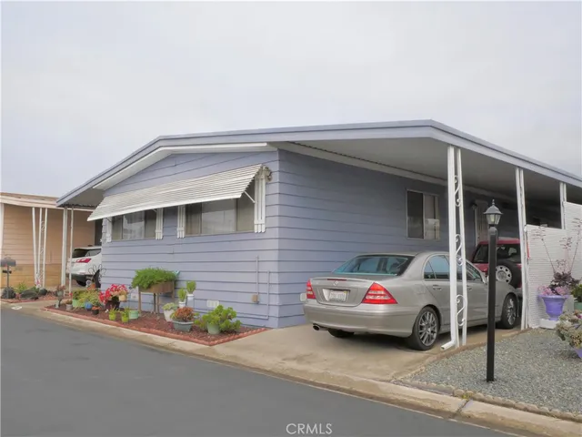 a reading room with furniture and book shelf