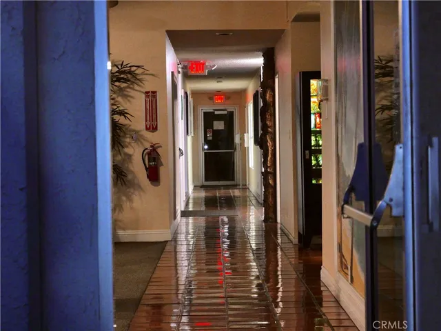 a kitchen with stainless steel appliances granite countertop a stove and a refrigerator