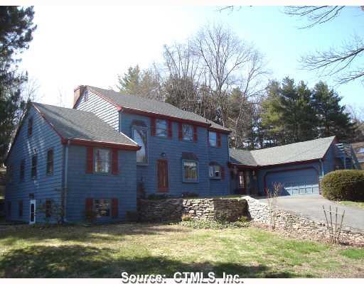 129 Wood Pond Road Farmington, CT 06107 - Photo 1 of 1 a view of a house with a yard