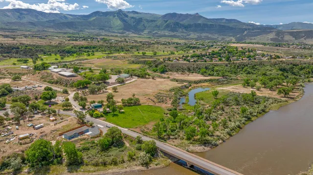 a view of a garden with an ocean