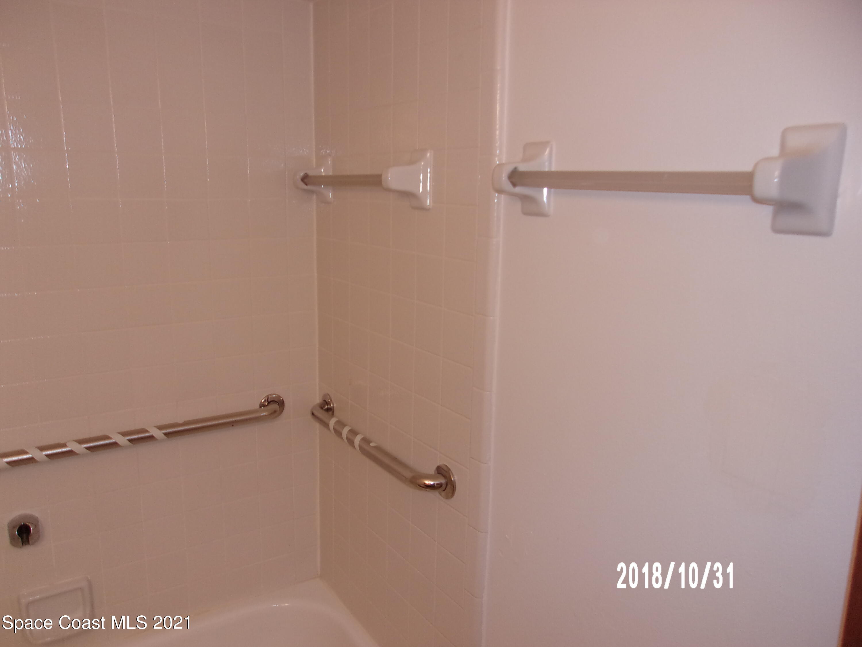 210 Spring Drive, Unit 6 Merritt Island, FL 32953 - Photo 21 of 35 a view of a bathroom