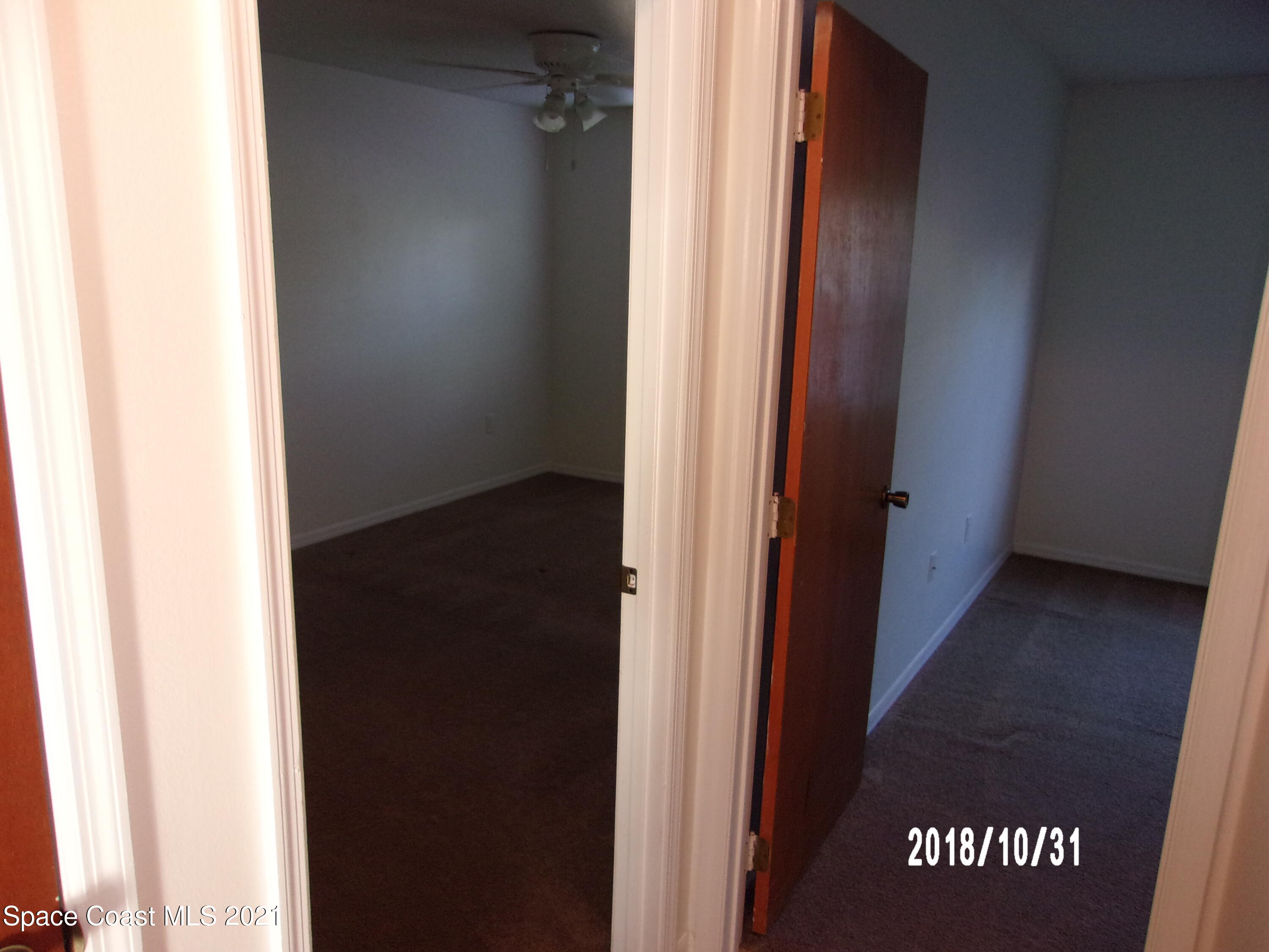 210 Spring Drive, Unit 6 Merritt Island, FL 32953 - Photo 23 of 35 a view of a front door