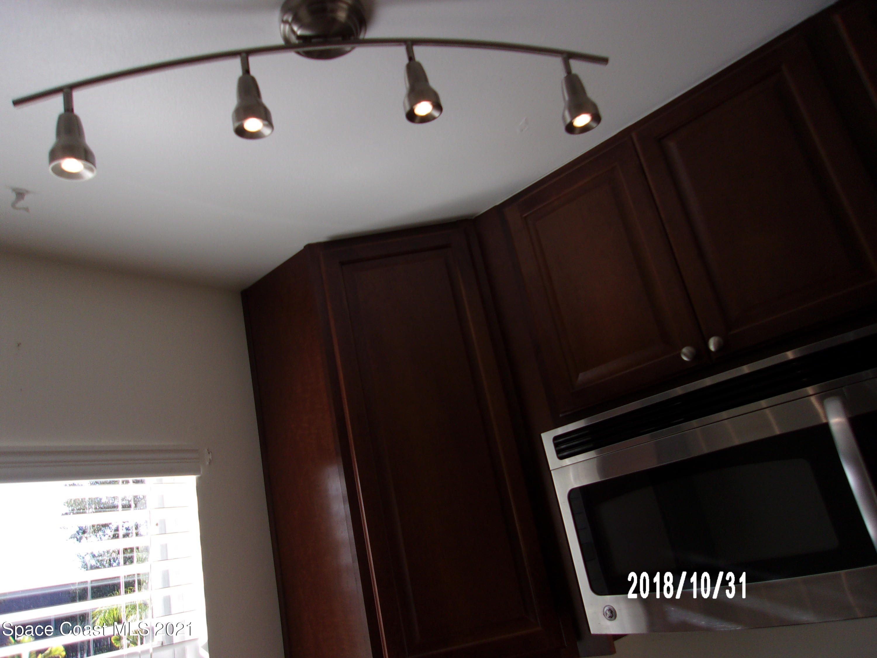 210 Spring Drive, Unit 6 Merritt Island, FL 32953 - Photo 7 of 35 a view of a hallway