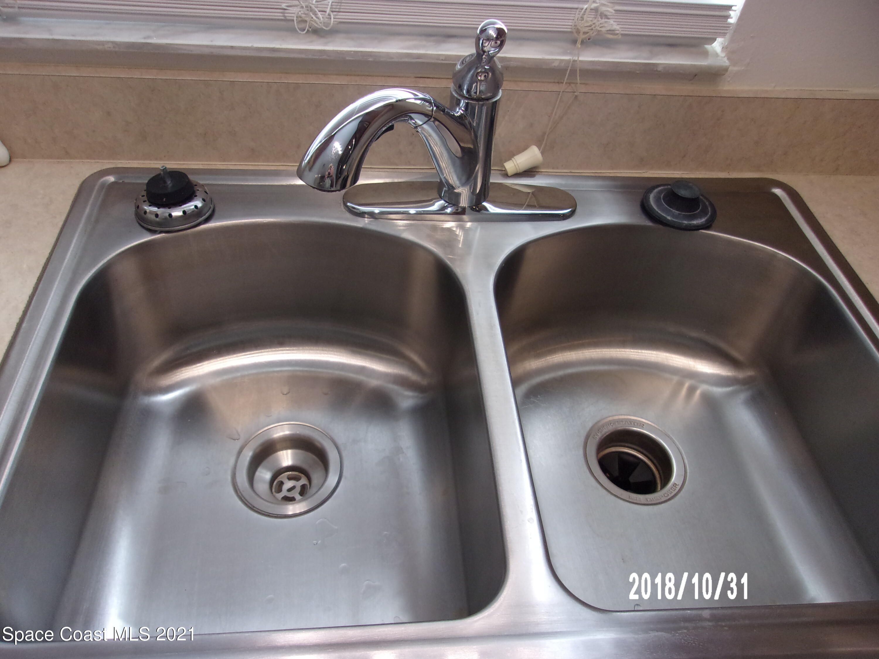 210 Spring Drive, Unit 6 Merritt Island, FL 32953 - Photo 8 of 35 a close view of sink