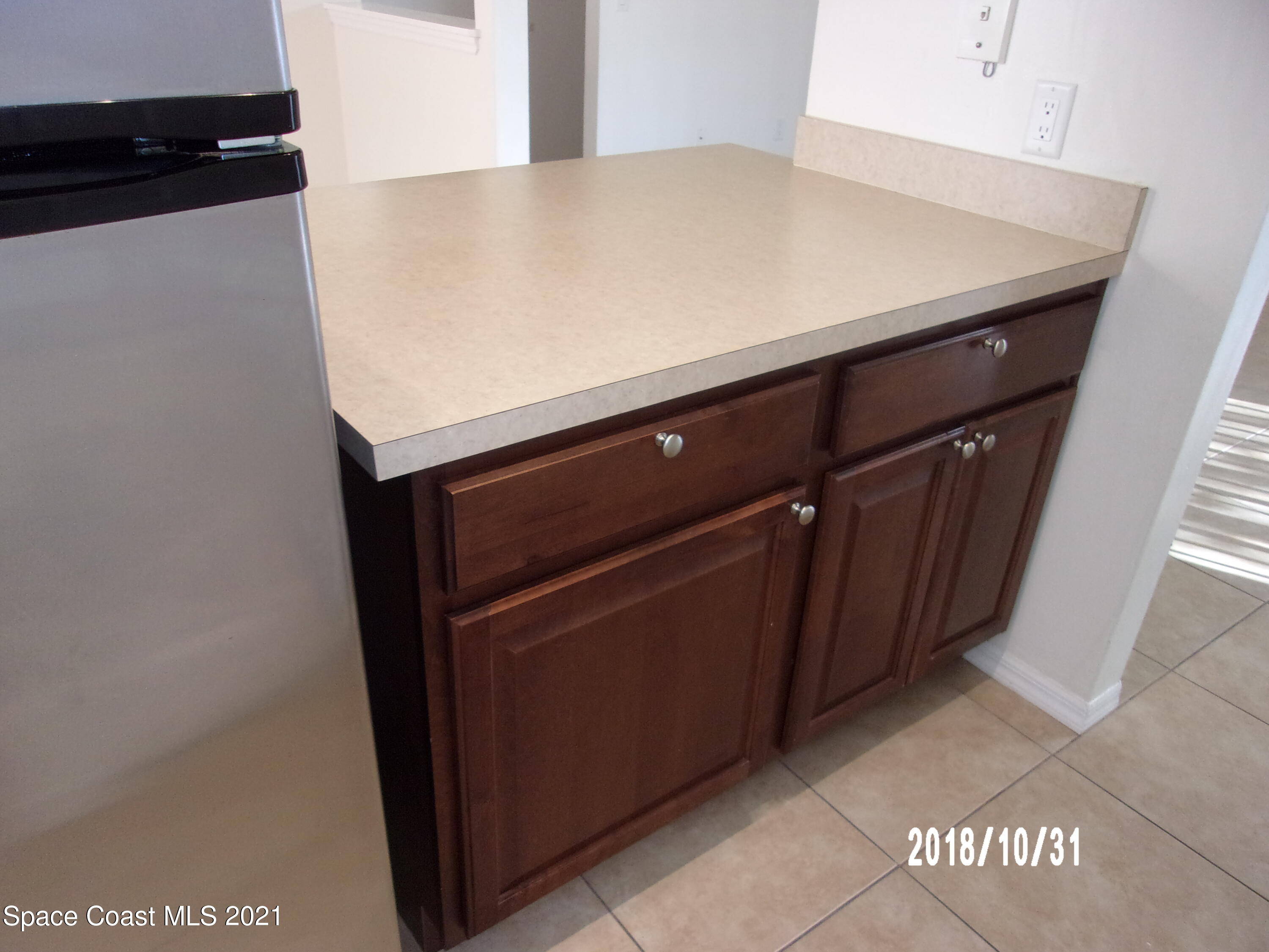 210 Spring Drive, Unit 6 Merritt Island, FL 32953 - Photo 9 of 35 a close up of a sink