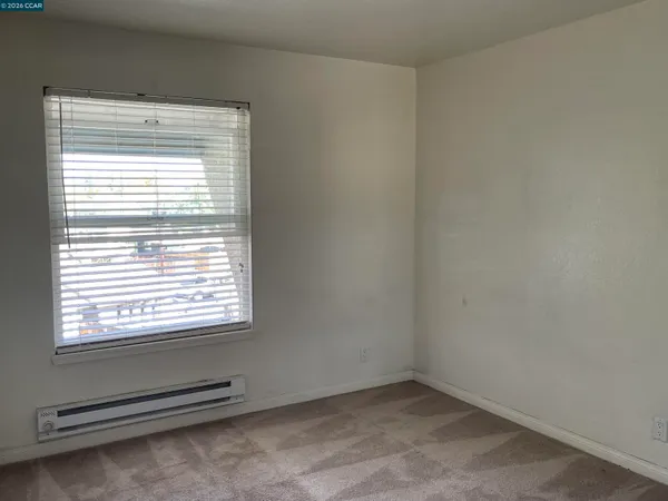 a view of a room with a window