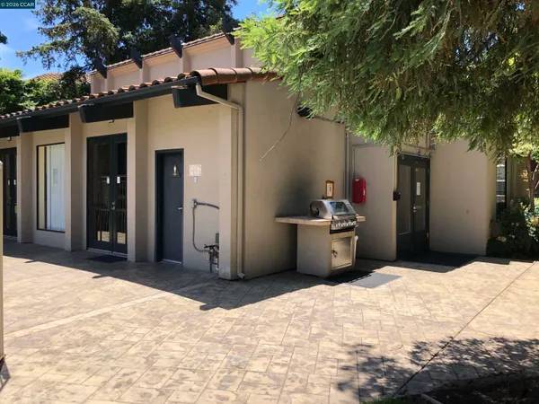 a view of a backyard of a house