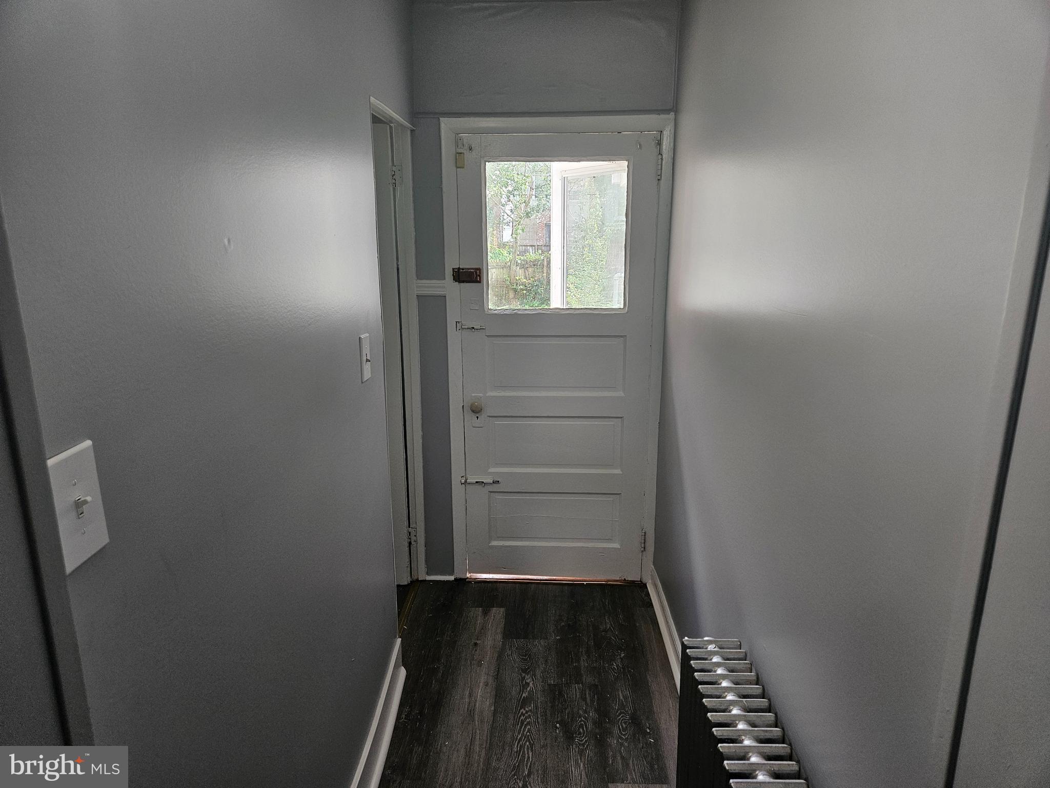 812 Kohn Street Norristown, PA 19401 - Photo 5 of 9 wooden floor in an empty room