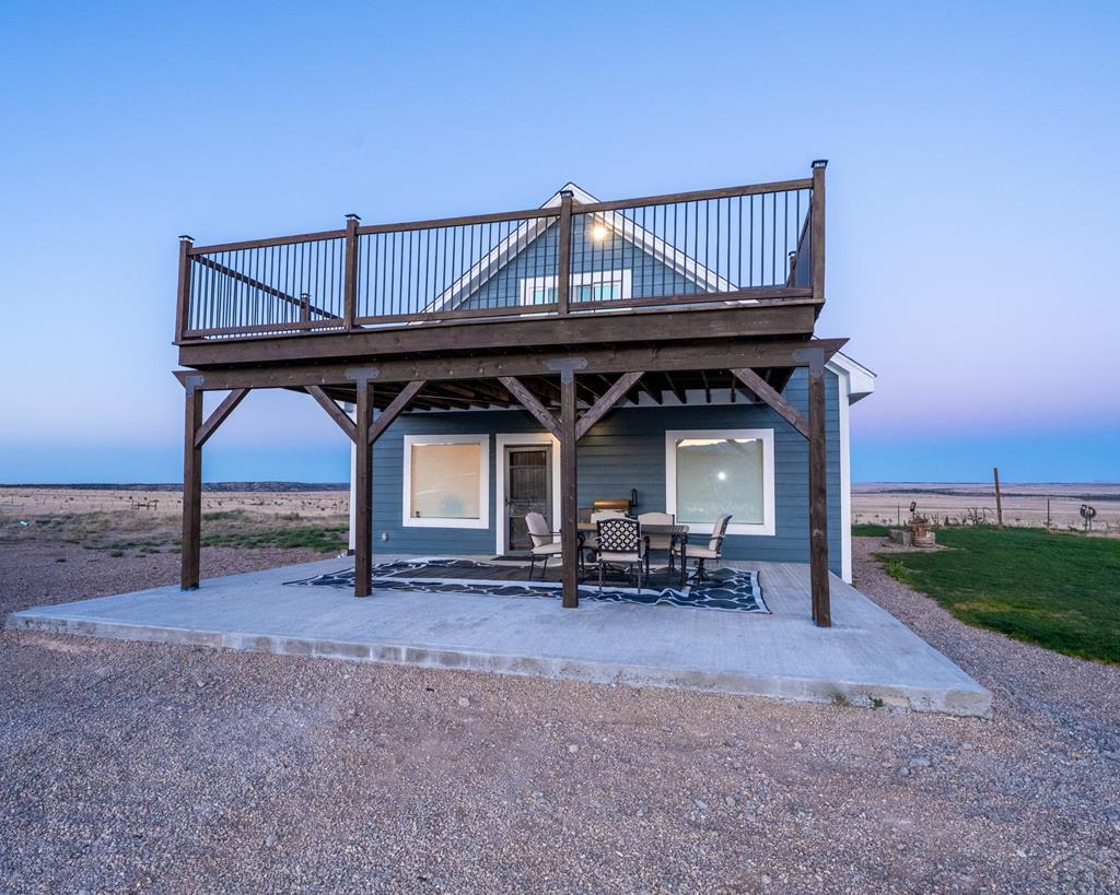 a view of a house with a patio and a porch