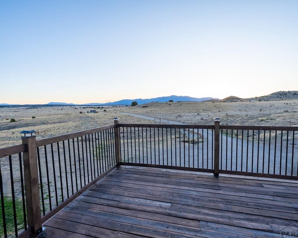 1611 Big Vista Road Rye, CO 81069 - Photo 23 of 27 a view of a terrace from wooden floor