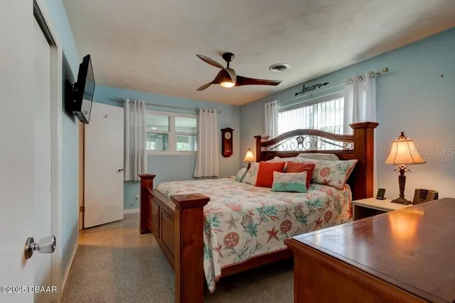 a bathroom with a sink vanity and a mirror