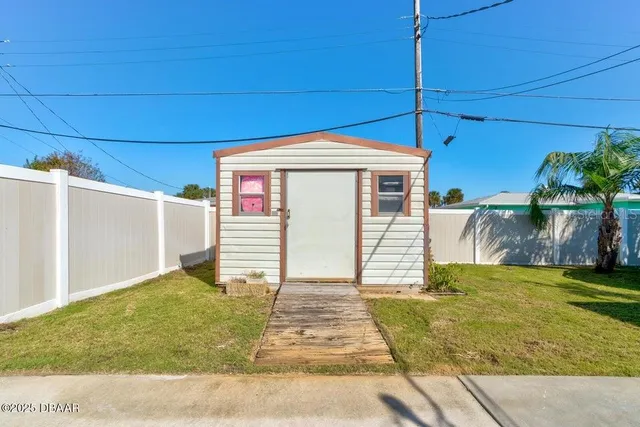a view of swimming pool with a patio