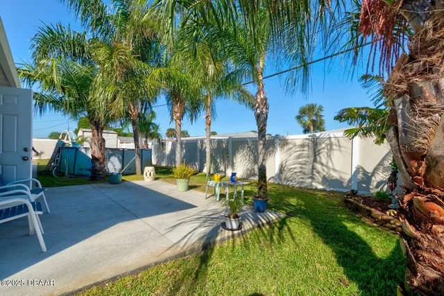 a house view with a garden space