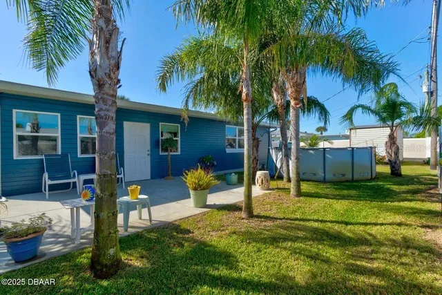 a house with garden in front of it