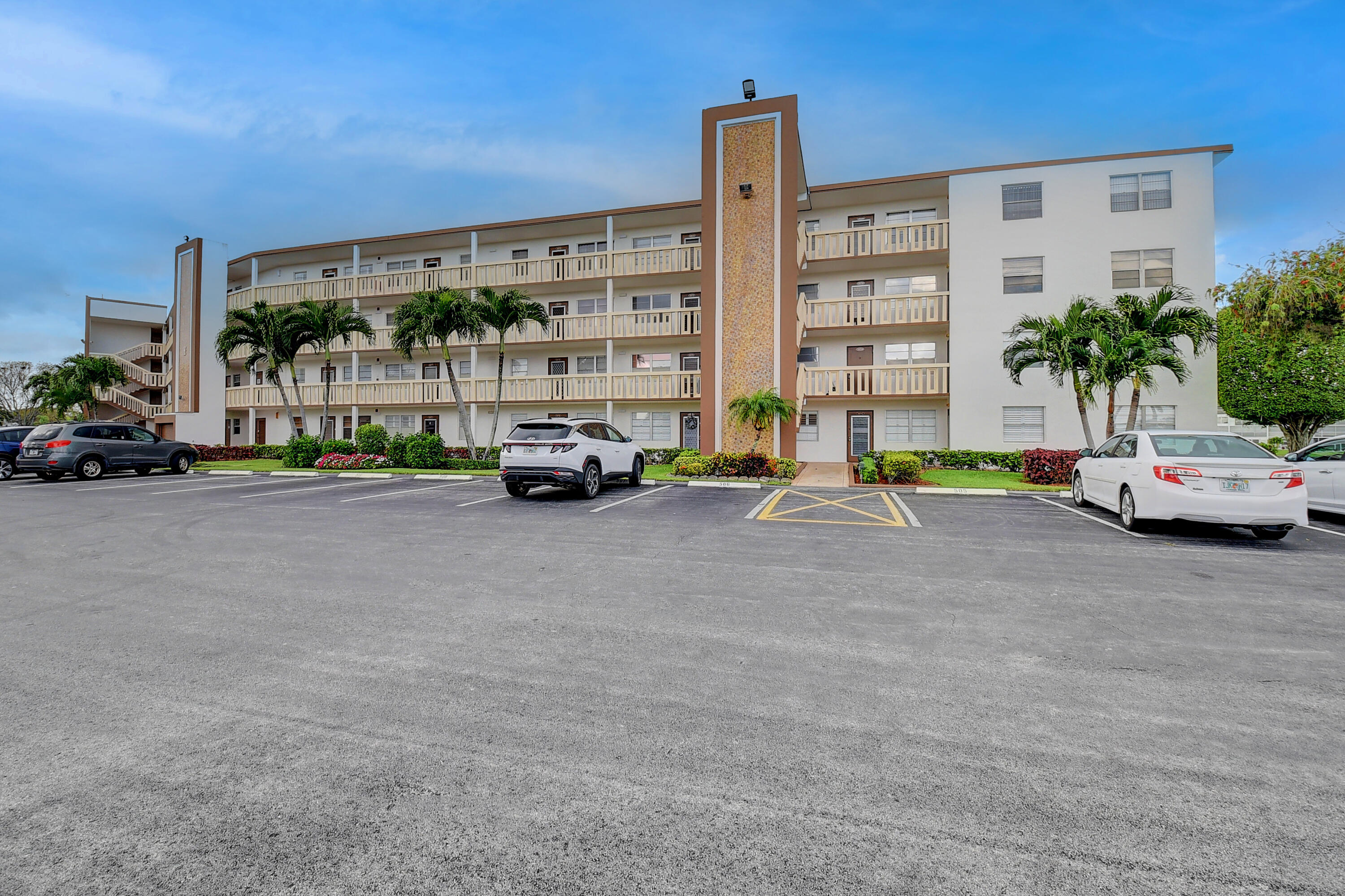 4076 Guildford East Boca Raton, FL 33434 - Photo 3 of 52 FRONT OF BUILDING