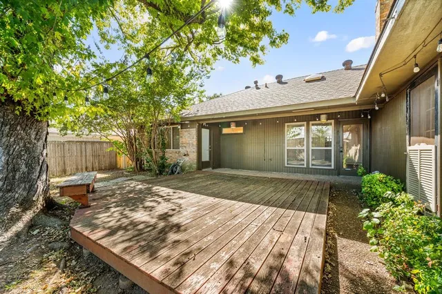 a view of a backyard of the house