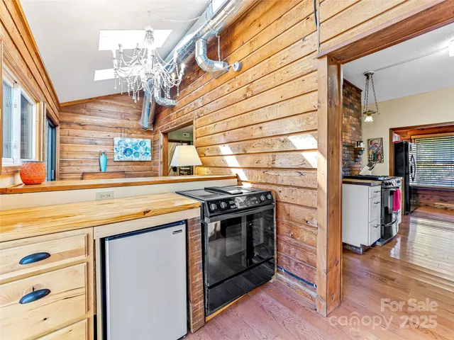 a bathroom with a sink mirror and a bathtub