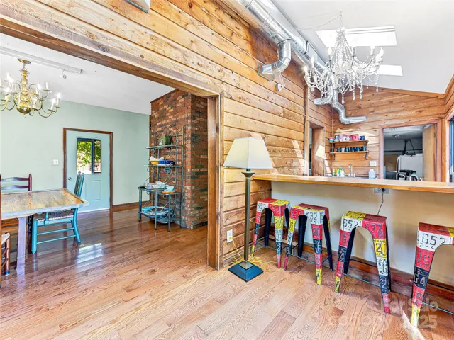 a kitchen with sink and cabinets