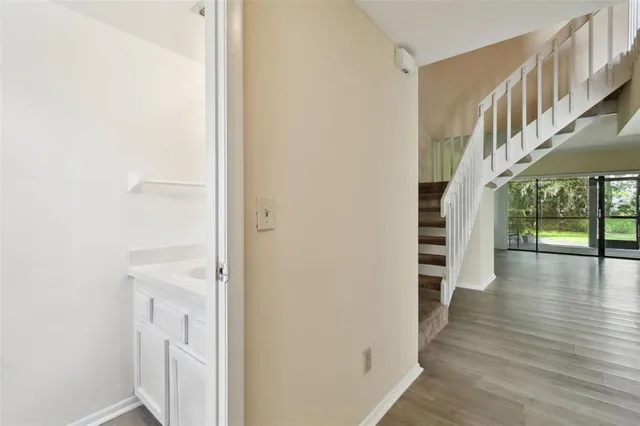 a view of entryway with wooden floor