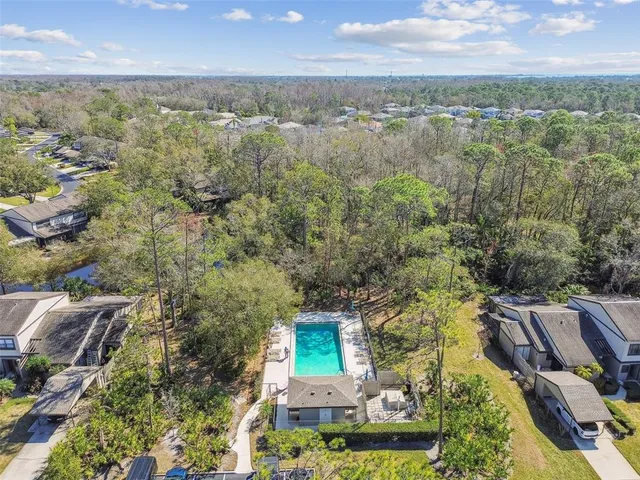 an aerial view of residential house with outdoor space