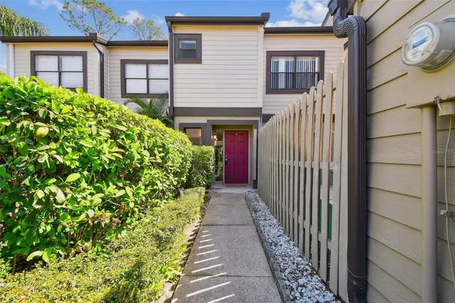 a view of a pathway with a house