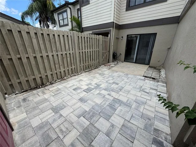 a view of a backyard of a house