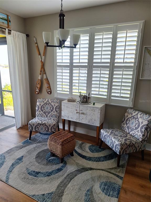 1121 Riverscape Street Bradenton, FL 34208 - Photo 40 of 74 a living room with furniture and a window