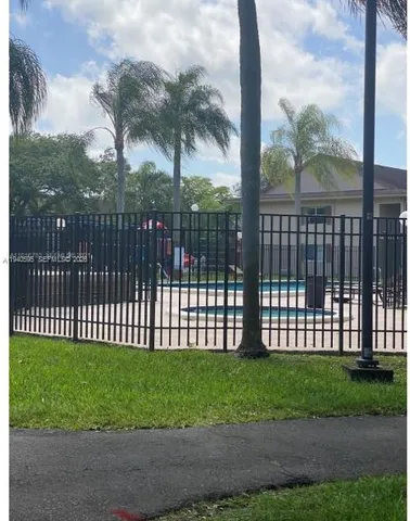 a view of a backyard with a garden