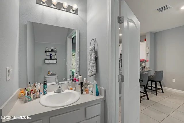 a bedroom with a bed and a closet