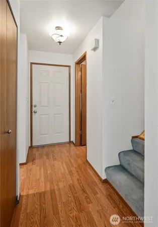 a kitchen with a stove and a microwave