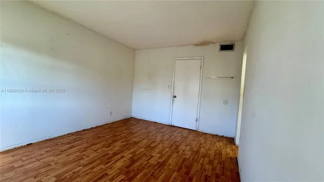 a view of a room with an empty space