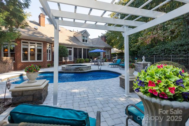 a building outdoor space with patio furniture and potted plants
