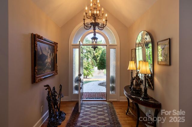 a view of a entryway with wooden floor