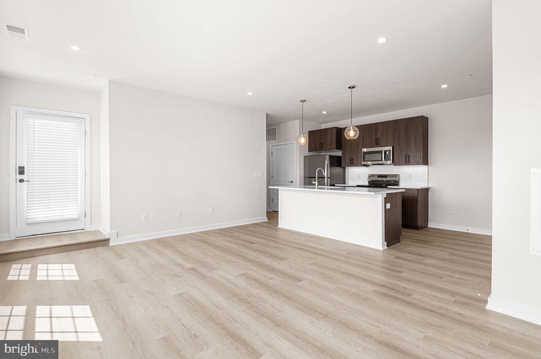 26 South York Road, Unit 409 Hatboro, PA 19040 - Photo 4 of 16 Modern open space with natural light.