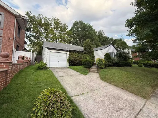 a view of a backyard of the house