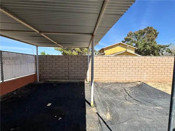 a view of a backyard of a house