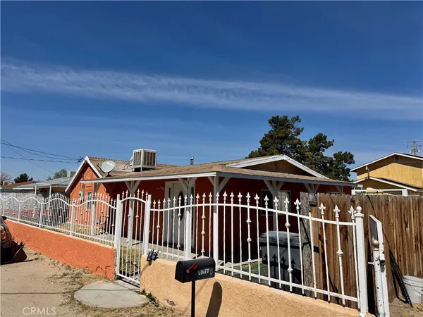 a stove top oven sitting inside of a kitchen