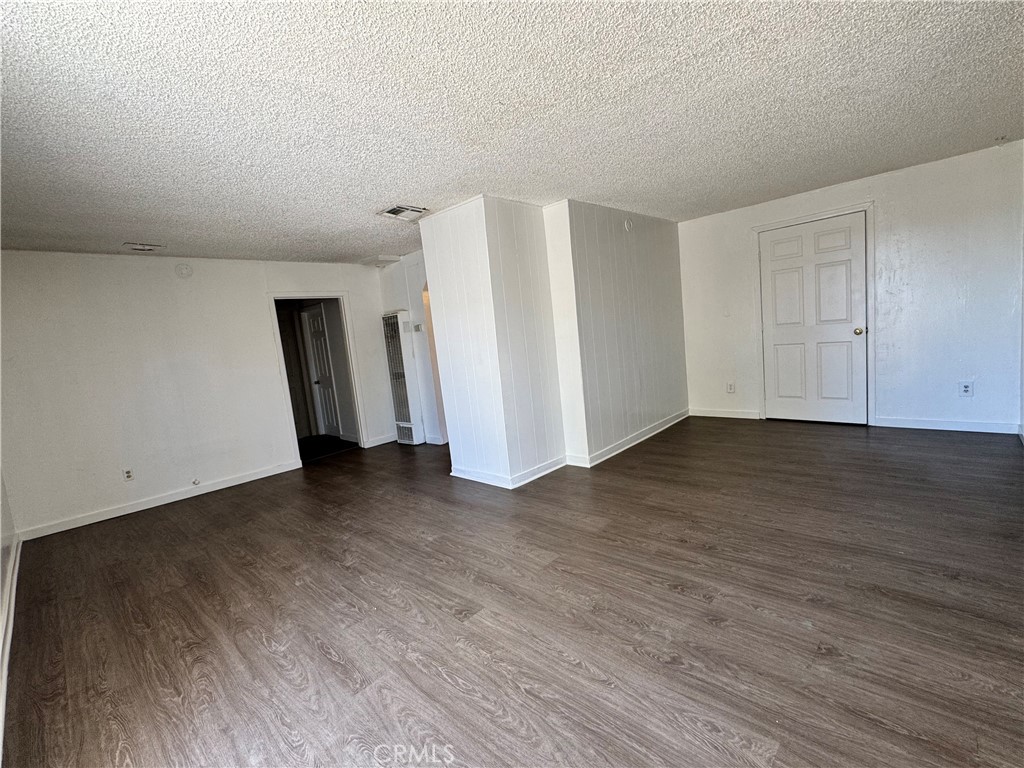 36528 Irwin Road Barstow, CA 92311 - Photo 8 of 35 a view of a livingroom with wooden floor