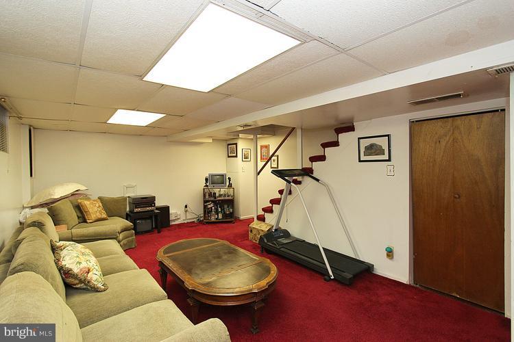 11942 Bluhill Road Silver Spring, MD 20902 - Photo 12 of 30 a room with gym equipment