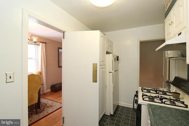 11942 Bluhill Road Silver Spring, MD 20902 - Photo 25 of 30 a view of kitchen and utility room