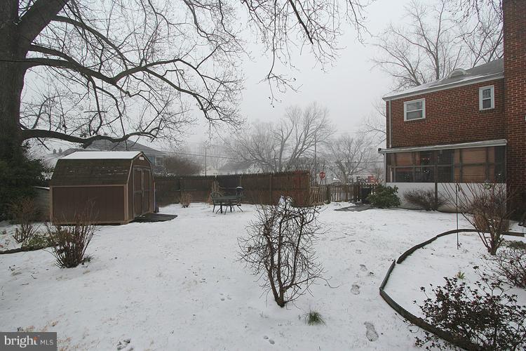 11942 Bluhill Road Silver Spring, MD 20902 - Photo 29 of 30 a view of a backyard of a house