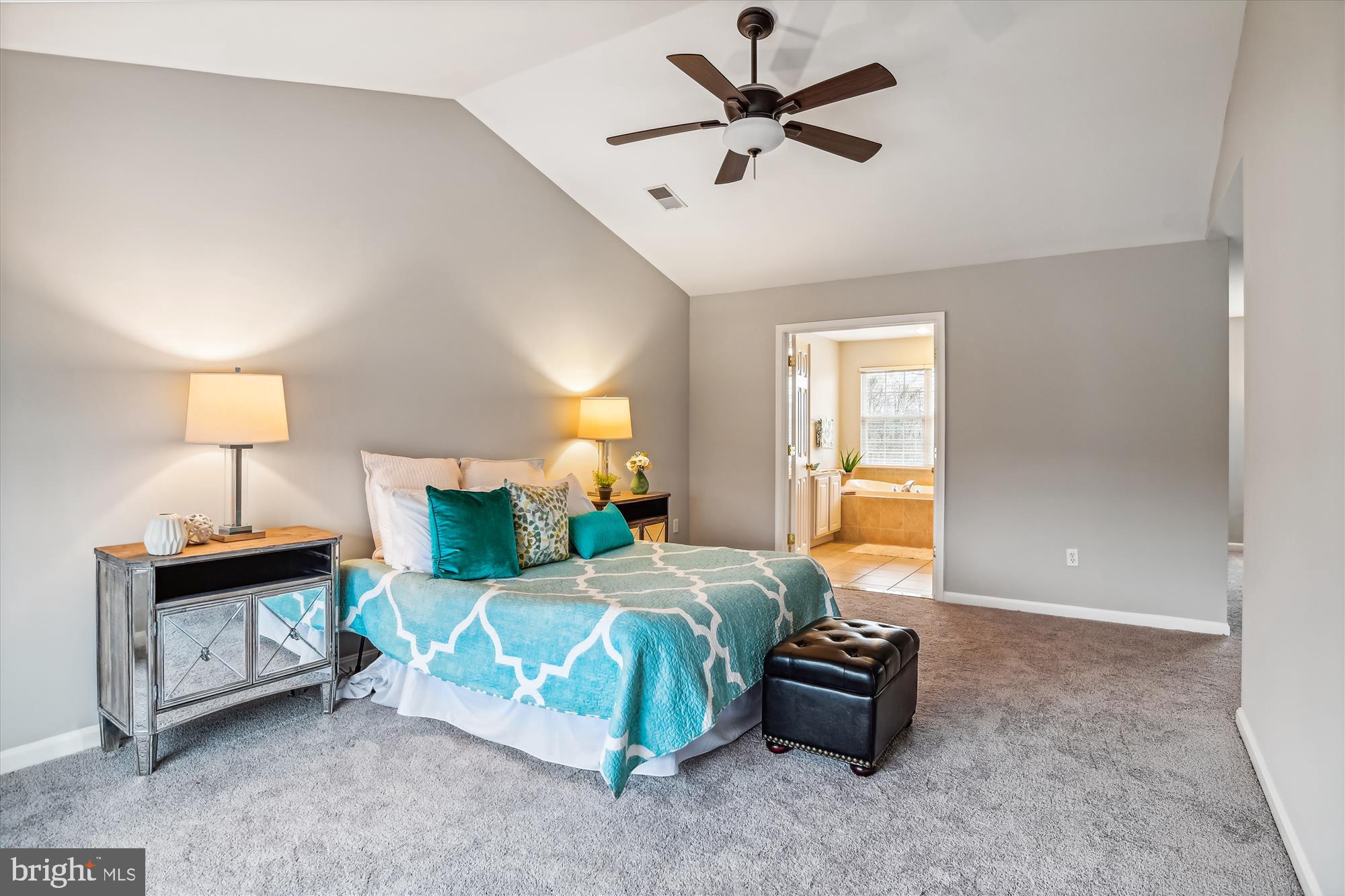 5958 Florey Road Hanover, MD 21076 - Photo 62 of 77 a bedroom with a bed a lamp and a window