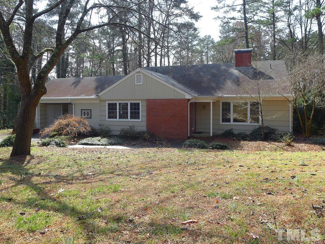 1400 Mason Farm Road, Unit A Chapel Hill, NC 27514 - Photo 1 of 20 a house that has a tree in front of it