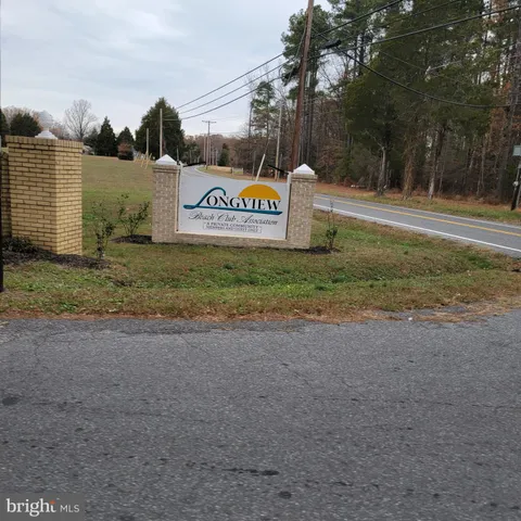 a view of a park with welcome board