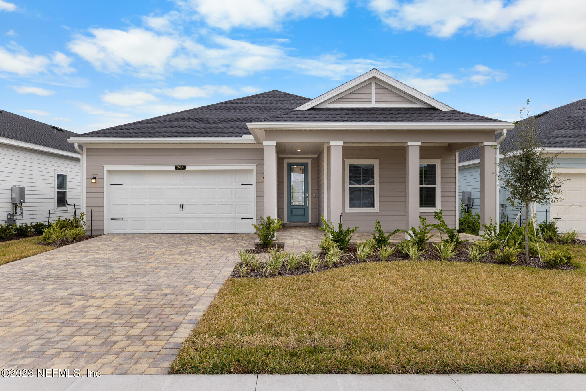 299 Pentwater Road St. Augustine, FL 32092 - Photo 1 of 25 a front view of a house with garden