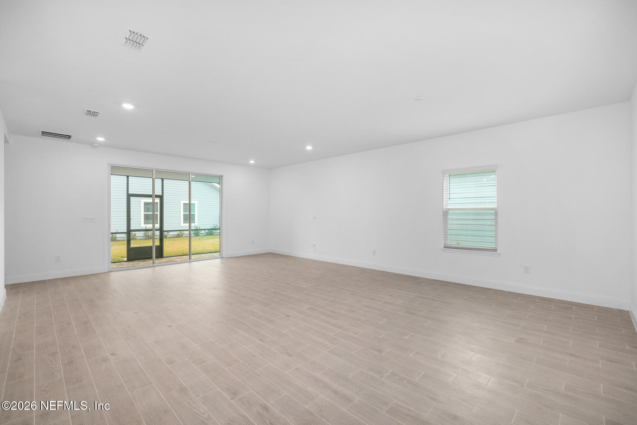 299 Pentwater Road St. Augustine, FL 32092 - Photo 13 of 25 an empty room with windows