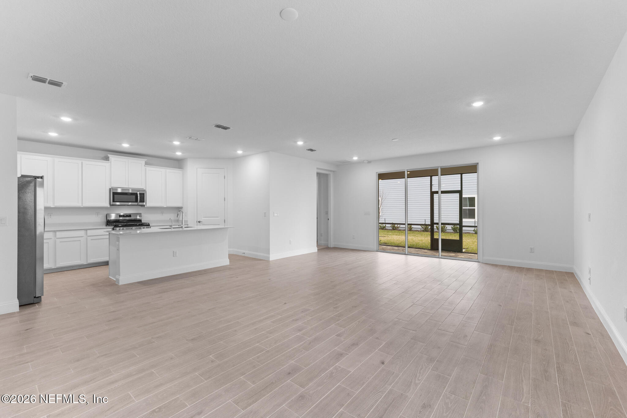299 Pentwater Road St. Augustine, FL 32092 - Photo 14 of 25 a view of kitchen with kitchen island and stainless steel appliances